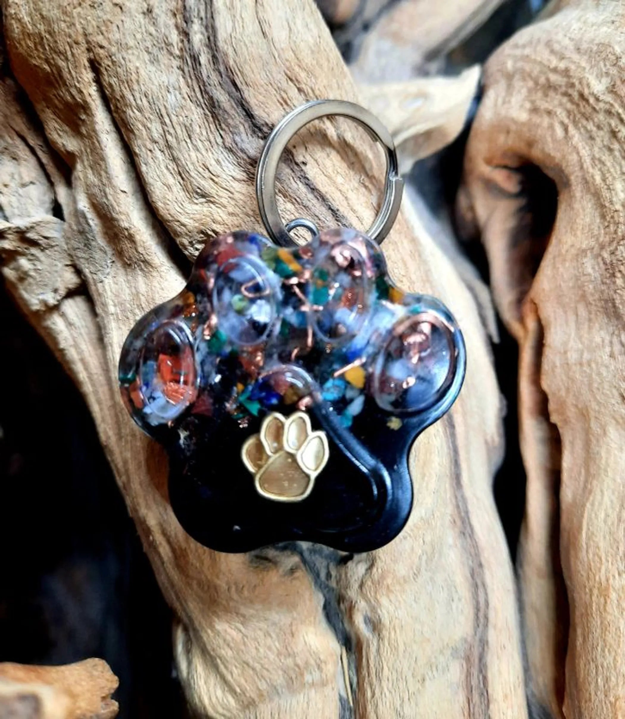 Secret Synergy Stones EMF 5G protection pet charm with paw print design, suitable as a collar charm for pets.