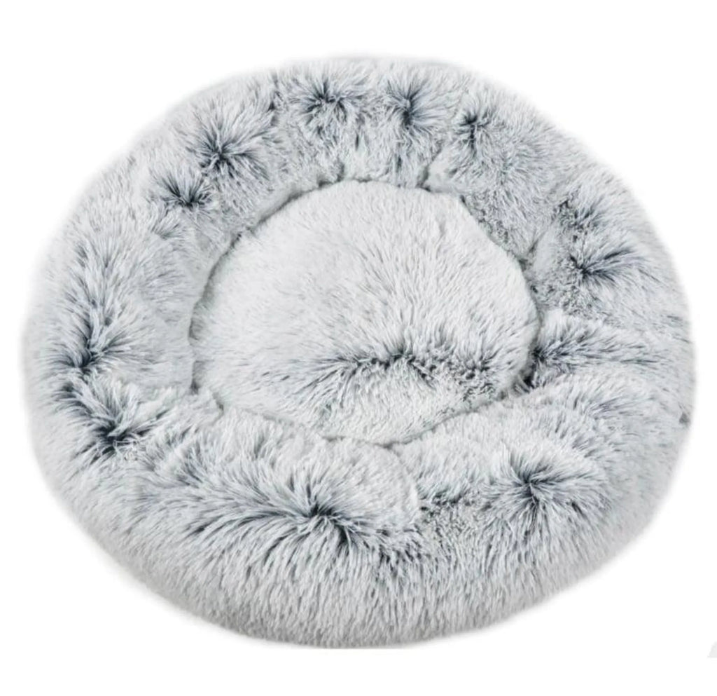 Soft Mr. Peanut's OrthoPlush dog bed with plush fabric and raised edges, designed for comfort and support for pets.