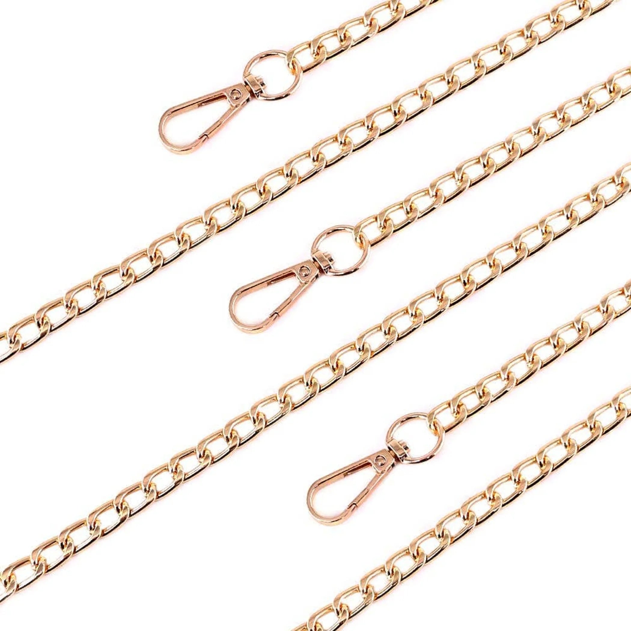 Pink rhinestone and gold metal dog leash by Bark Fifth Avenue, featuring elegant design and durable hardware for stylish pet walks.
