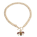 Dog collar featuring a rhinestone bee toggle clasp by Bark Fifth Avenue, showcasing a stylish and decorative accessory.