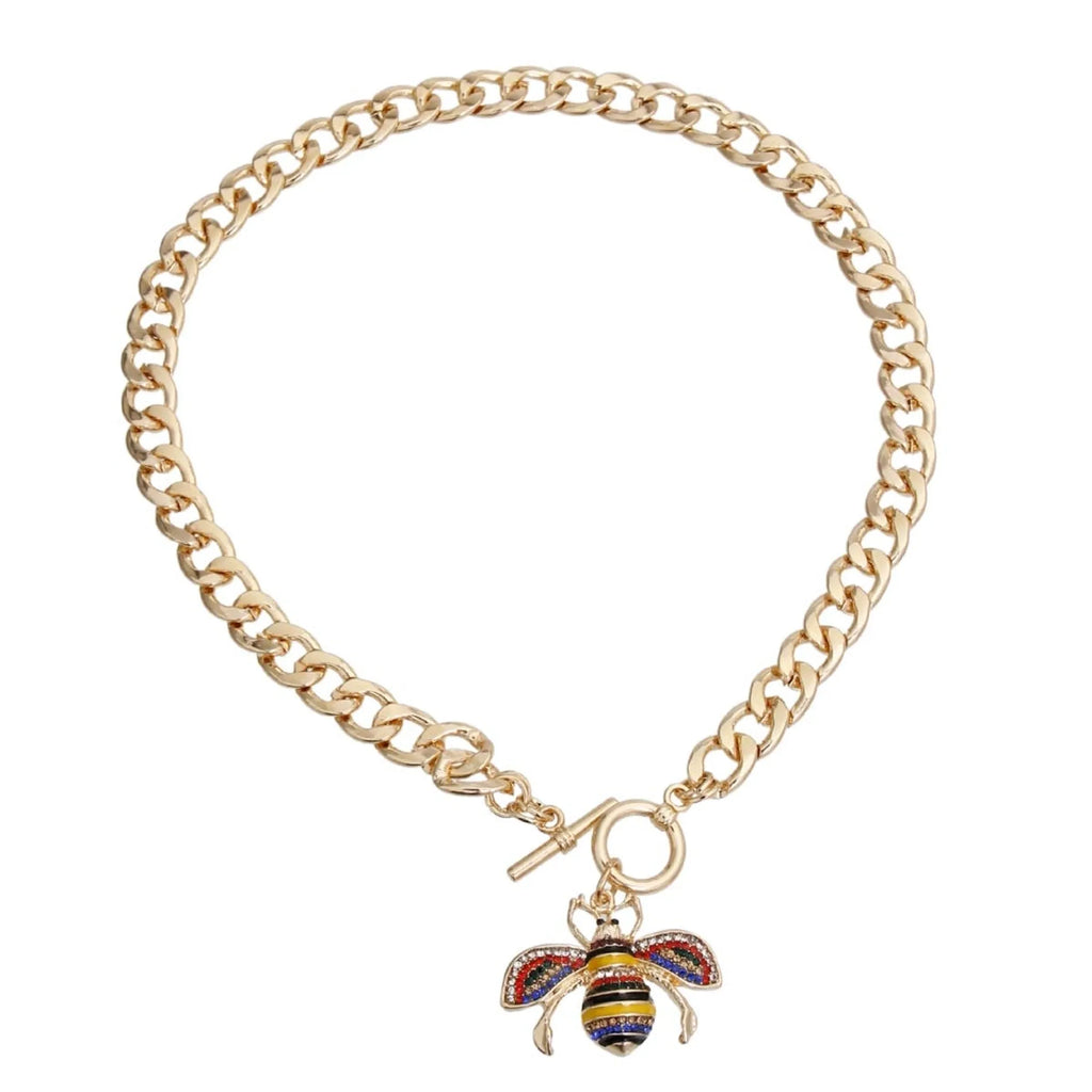 Dog collar featuring a rhinestone bee toggle from Bark Fifth Avenue, with detailed metallic bee and sparkling rhinestone accents.