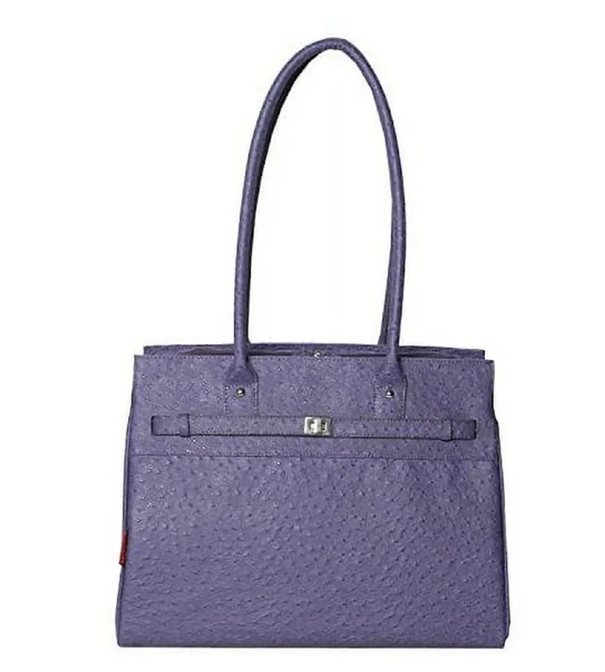 Dog wearing Bark Fifth Avenue Ostrich Periwinkle pet carrier, stylish dog clothing accessory for pets.