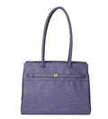 Dog wearing Bark Fifth Avenue Ostrich Periwinkle pet carrier dog clothes, showcasing stylish and comfortable pet apparel.