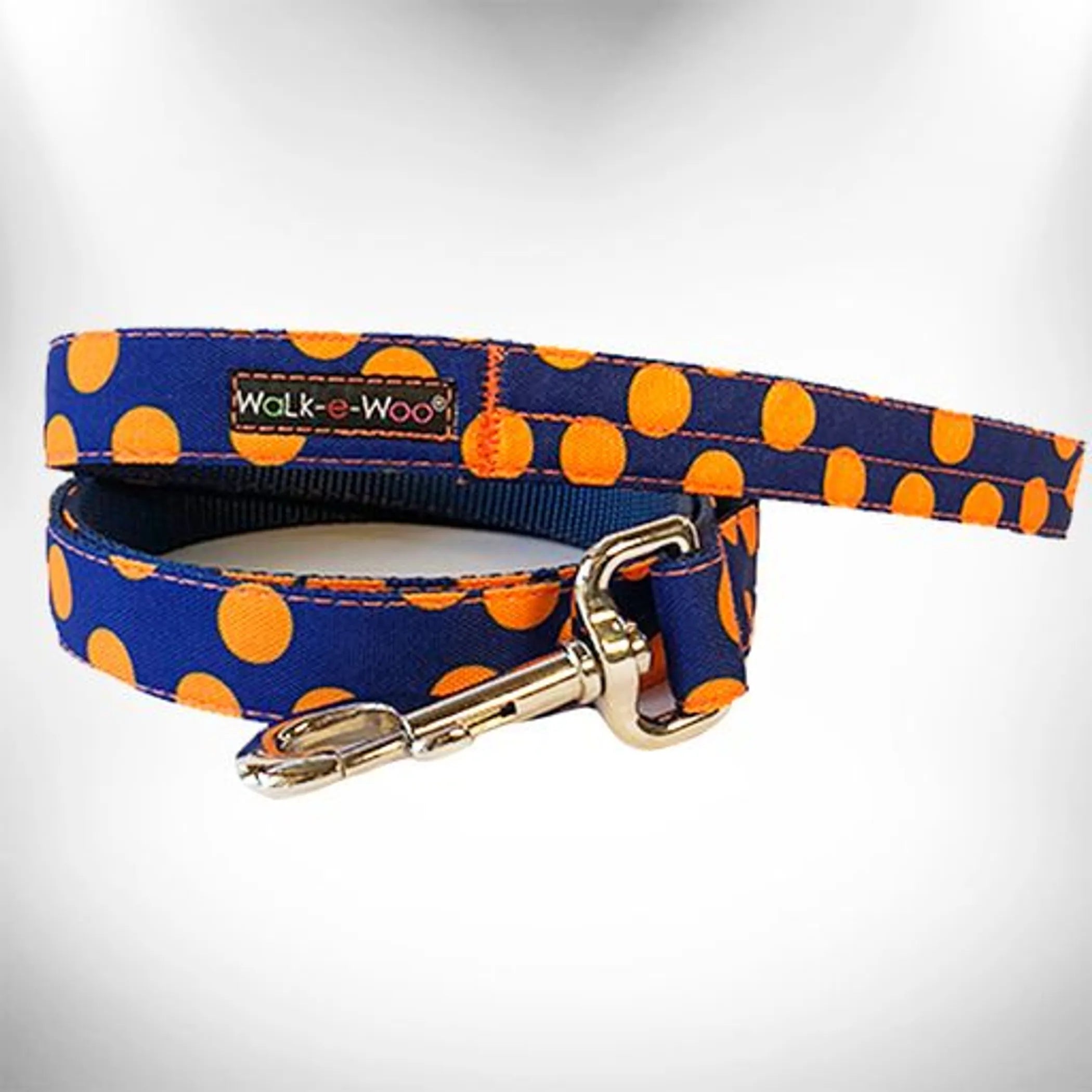 Walk-e-Woo polka dot dog collar with adjustable strap and metal buckle, featuring a playful polka dot pattern.