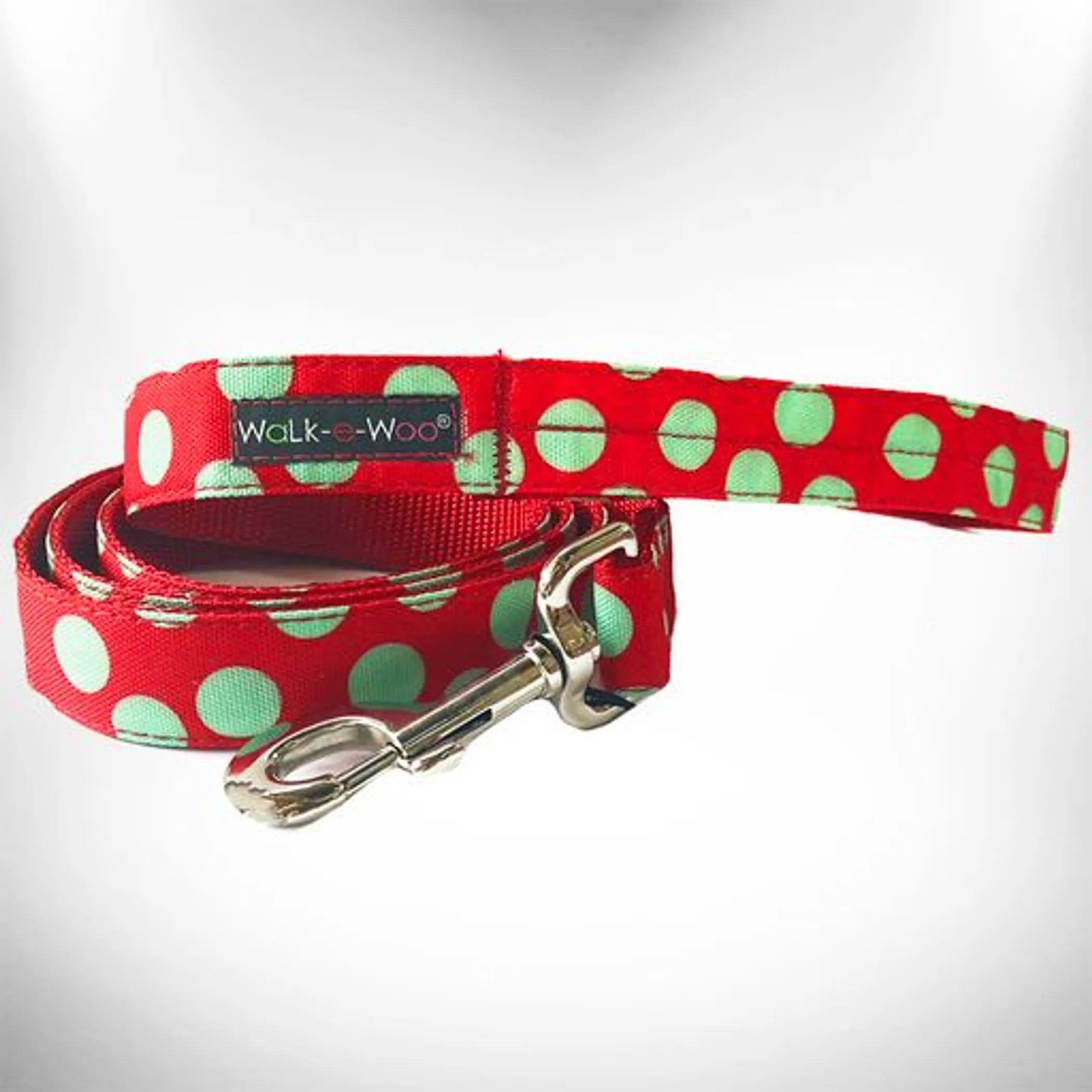 Walk-e-Woo polka dot dog leash and collar set featuring vibrant polka dot pattern, durable nylon material, and adjustable fit.