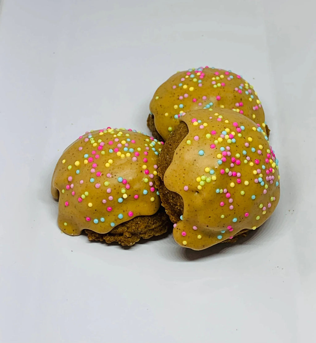 Blue Cerebus Dog Bakery Reese Cake Balls treats for dogs, featuring gourmet peanut butter flavor in a close-up image.