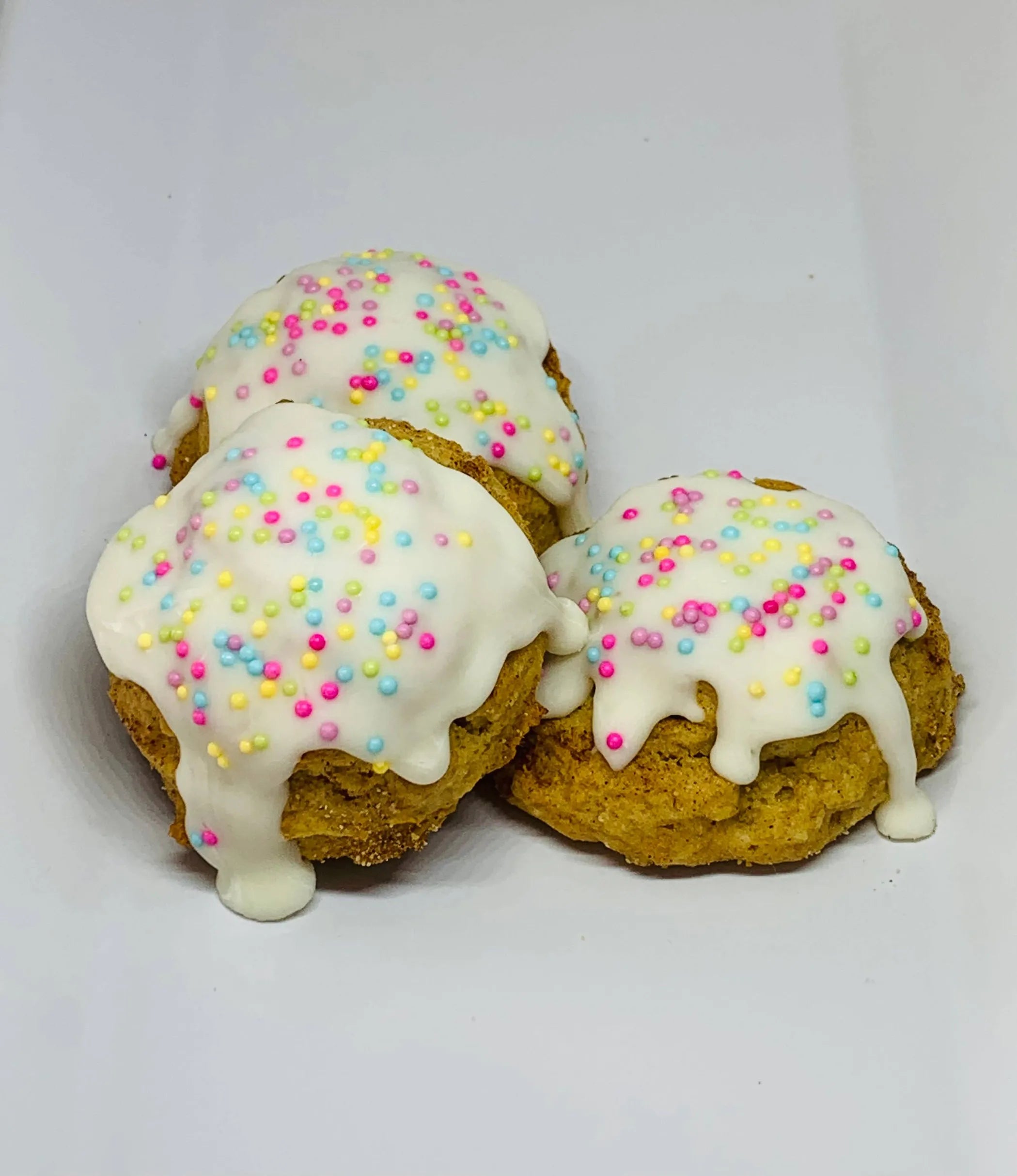 Blue Cerebus Dog Bakery Snicker'Poodle Cake Balls treat for dogs, showing colorful, bite-sized pet snacks in a clear container.