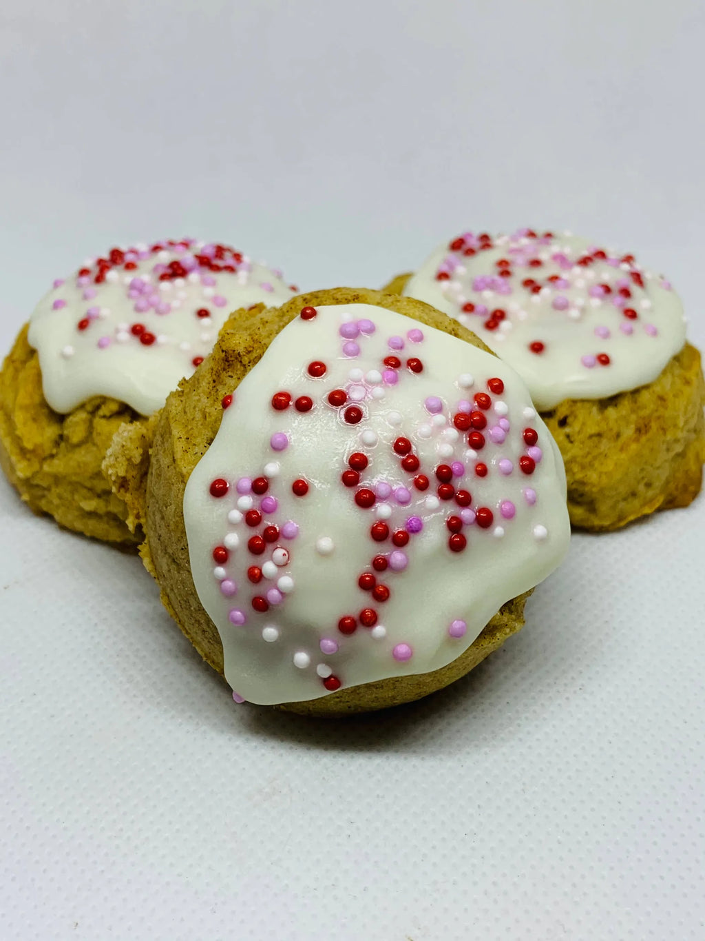 Snicker'Poodle Cake Balls dog treats from The Blue Cerebus Dog Bakery, tasty pet snacks for small dogs, with colorful cake ball design.