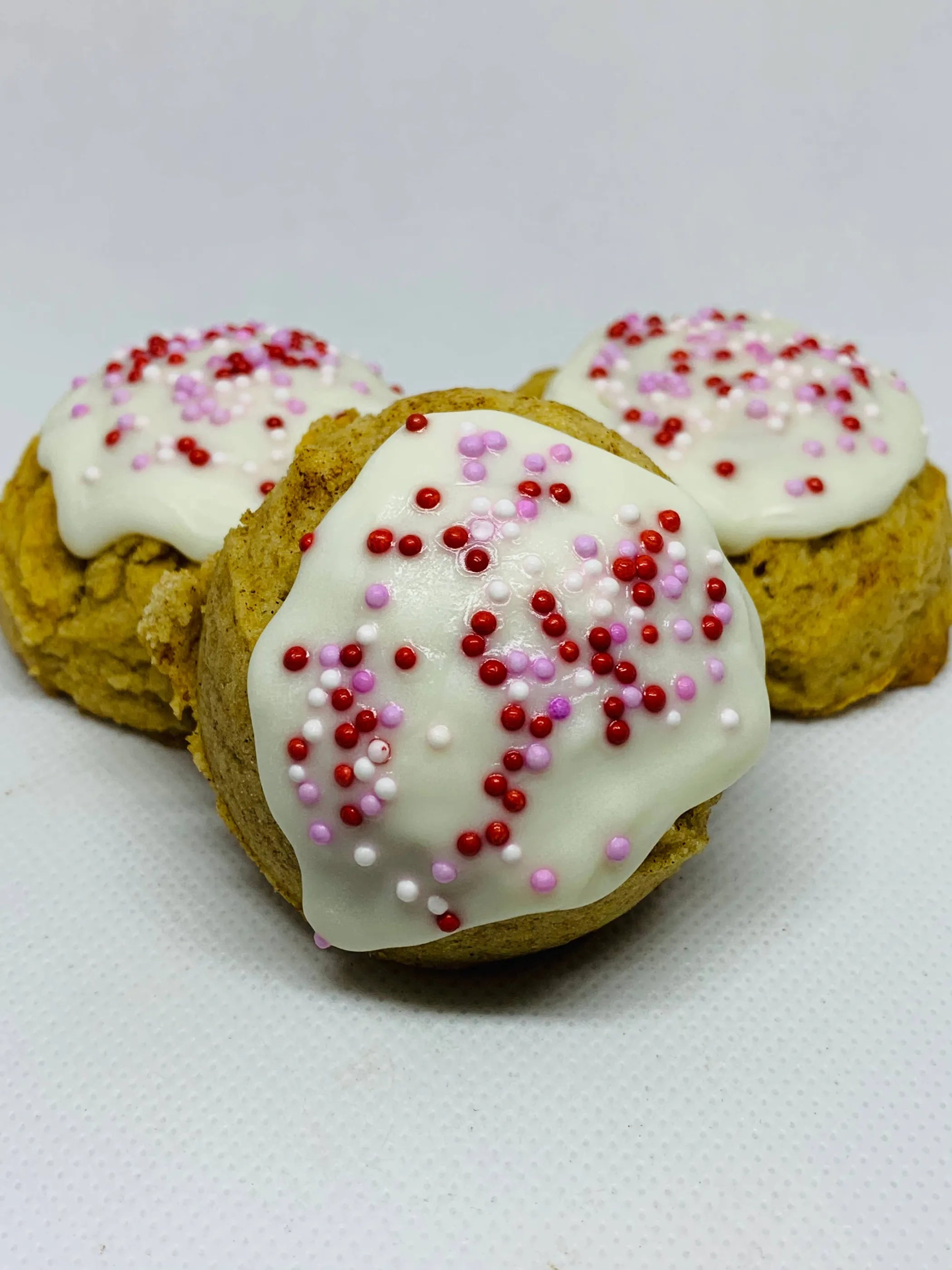 Snicker'Poodle Cake Balls dog treats from The Blue Cerebus Dog Bakery, tasty pet snacks for small dogs, with colorful cake ball design.