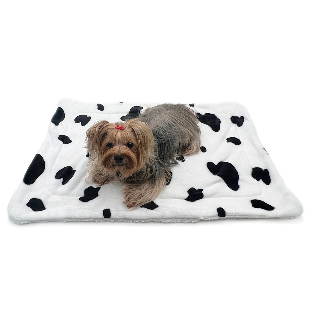 Klippo Pet Inc Ultra Plush Moo Cow Blanket dog clothes with soft fabric and cow print design on a cozy blanket