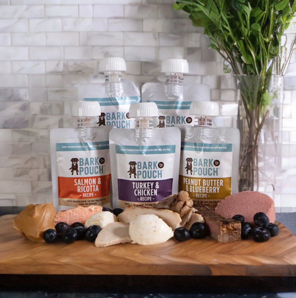 Five-pack of Bark Pouch lickable dog treats in colorful packaging, ideal for rewarding and entertaining dogs.