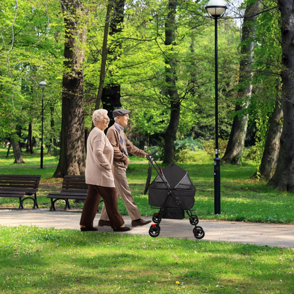 Black foldable 4-wheel pet stroller by Linx Group, designed for travel with a comfortable carrier and easy folding feature.