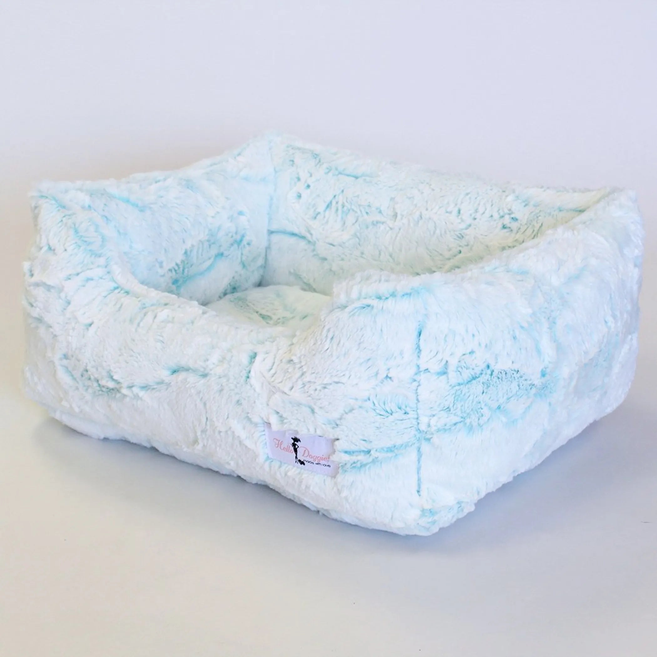 Soft luxury dog bed from Hello Doggie Inc.'s Whisper Collection, featuring plush fabric and cozy design for small to medium dogs.