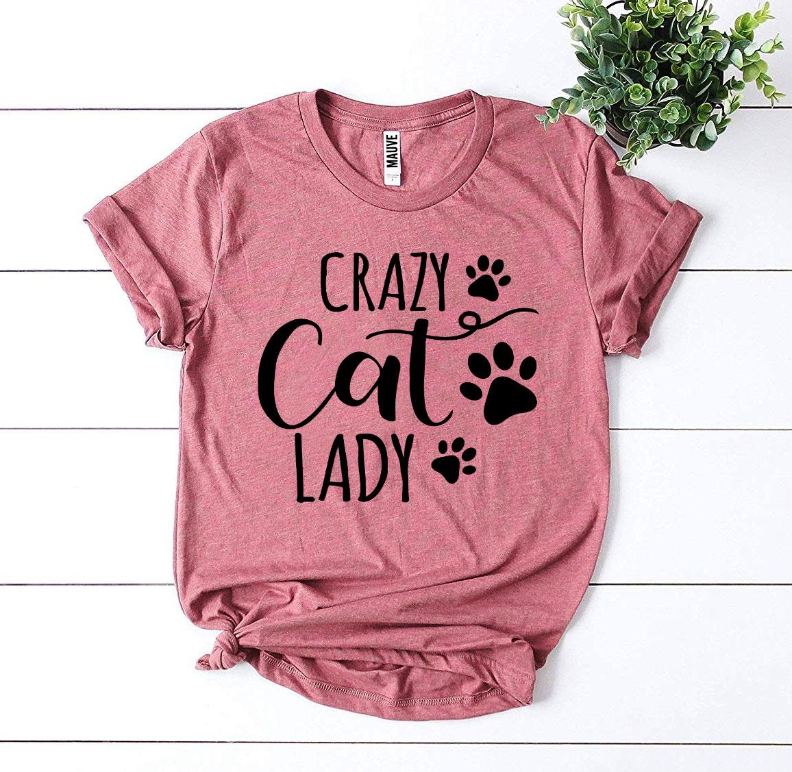 White Crazy Cat Lady T-shirt by Agate featuring playful cat graphics on soft cotton fabric.