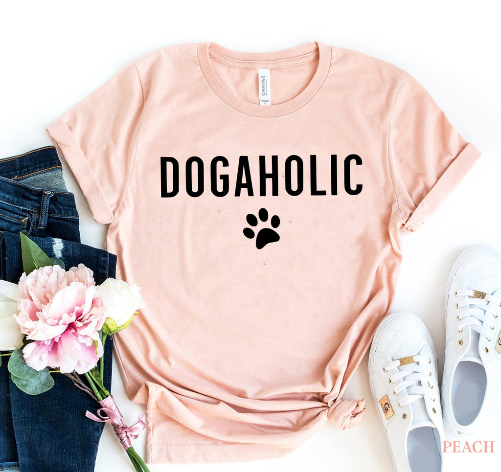 Black Dogaholic T-shirt by Agate, shown in size XS, featuring a casual fit and graphic design on the front.