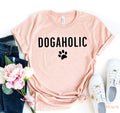 Black Dogaholic T-shirt by Agate, shown in size XS, featuring a casual fit and graphic design on the front.