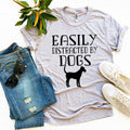 Heather gray Agate T-shirt featuring the "Easily Distracted By Dogs" graphic, casual fit, perfect for dog lovers.