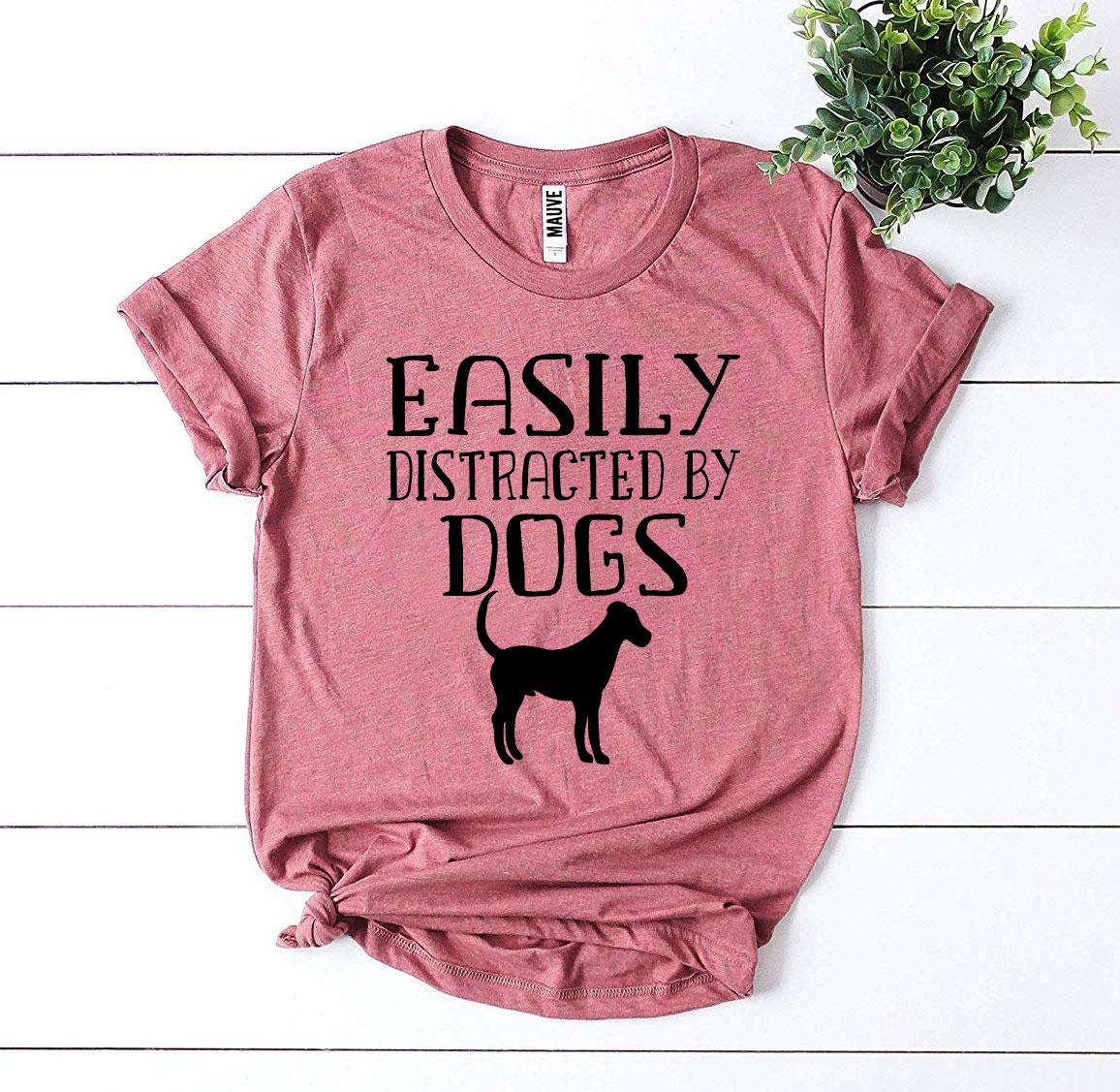 Heather gray Agate T-shirt featuring a playful "Easily Distracted By Dogs" graphic, casual and comfortable everyday wear.