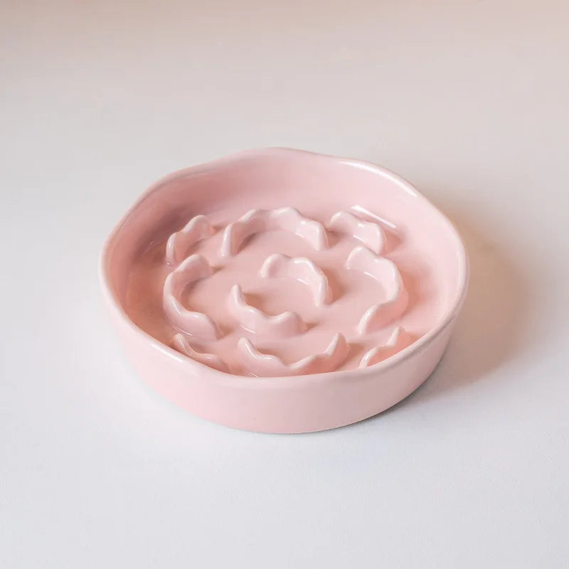 White ceramic slow food cat bowl with high footed design and neck protection, ideal for feeding cats comfortably.
