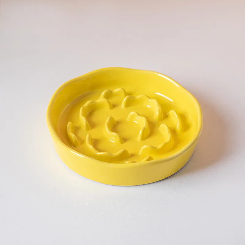 White ceramic high-footed cat bowl with slow feeding design and neck protection feature, ideal for gentle eating and neck support.