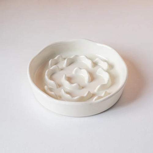 White ceramic slow food cat bowl with high footed design and neck protection, ideal for preventing over-eating and neck strain.
