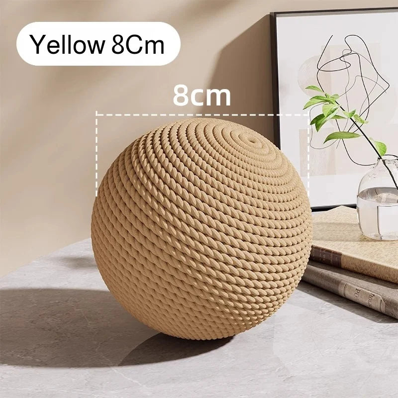 Brown 8-10cm sisal cat scratching ball toy for kittens, interactive toy to help with teeth and scratching fun.