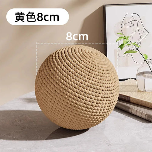 Brown 8-10cm sisal cat scratching ball toy for kittens, interactive toy to help with teeth and scratching instincts.