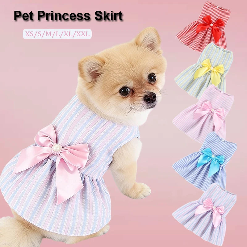 Small dog wearing purple flower princess dress, cute dog apparel for pets, featuring floral design and ruffled details.