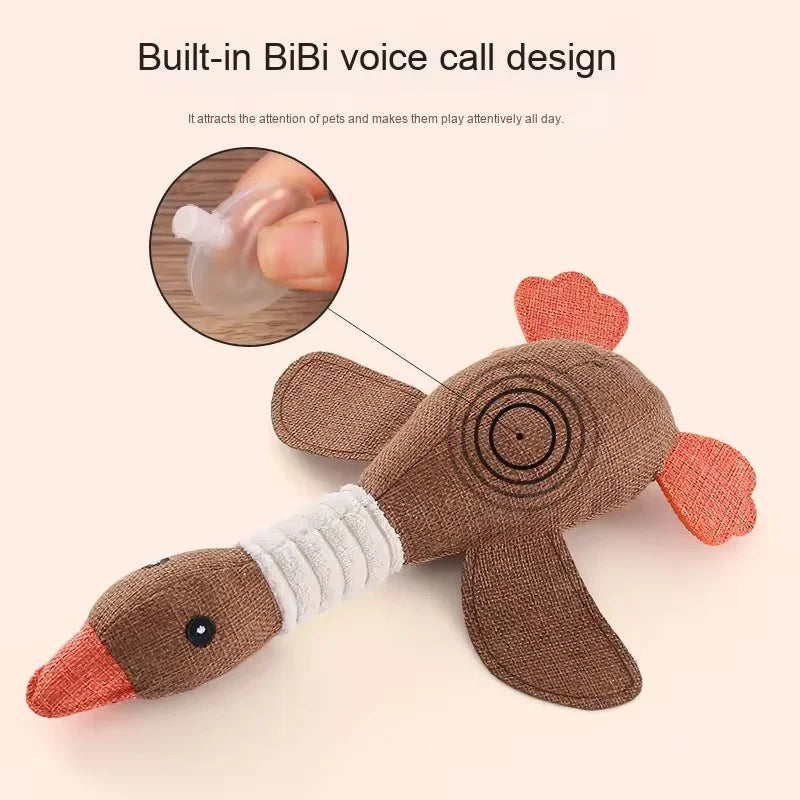 Gray eco-friendly plush duck dog toy with squeaker, perfect for chewing and play, designed for dogs.