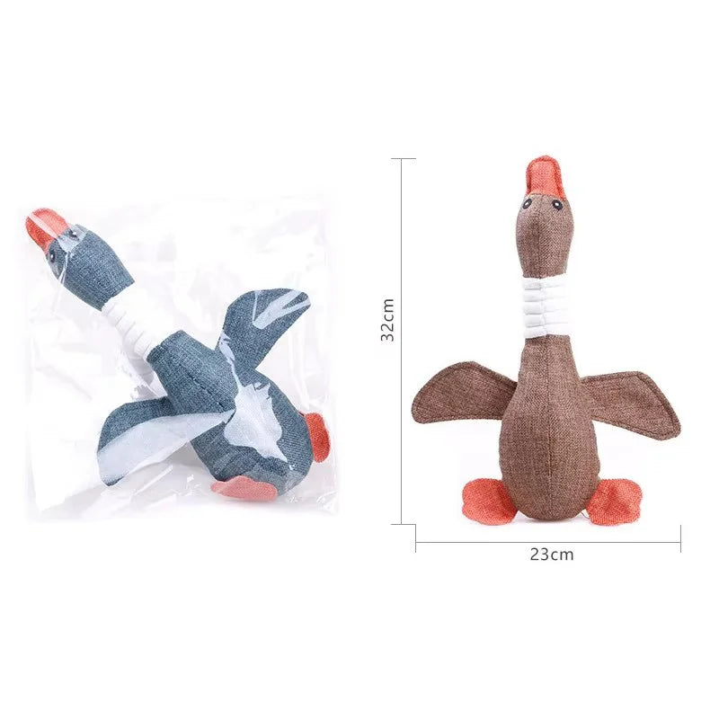 Gray plush duck dog toy with squeaker, eco-friendly design, perfect for chewing and playing with dogs.