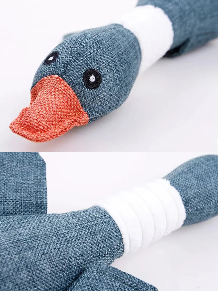 Gray eco-friendly plush duck dog toy with squeaker, perfect for chewing and play, by AliExpress dog toys brand.