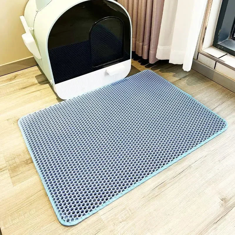 Pink waterproof double-layer cat litter mat for pet litter boxes, designed to catch and contain litter spills.