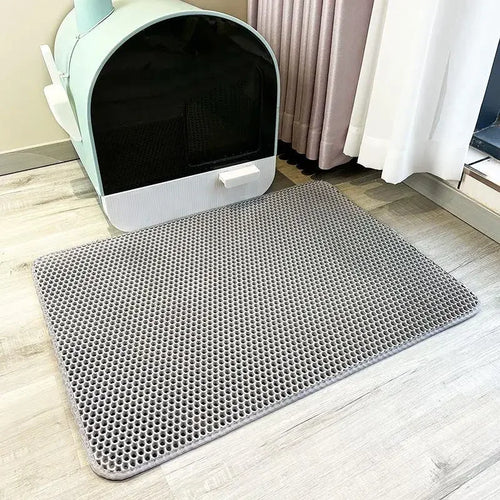 Pink waterproof double-layer cat litter mat for pet toilet, designed to catch litter and keep floors clean.