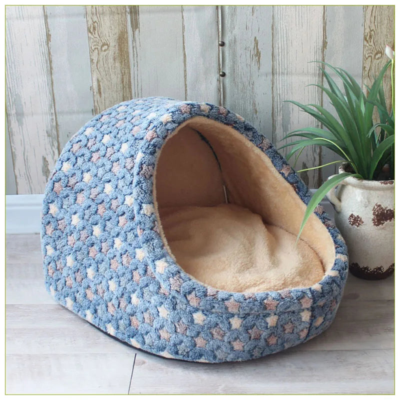 Soft cozy pet house bed for small dogs and cats, with plush interior and rounded shape, ideal for resting and sleeping.