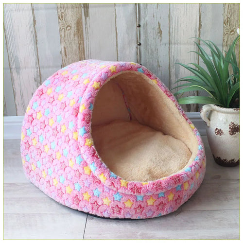 Soft, cozy pet house bed for small dogs and cats, featuring a plush interior and enclosed design for comfort and warmth.