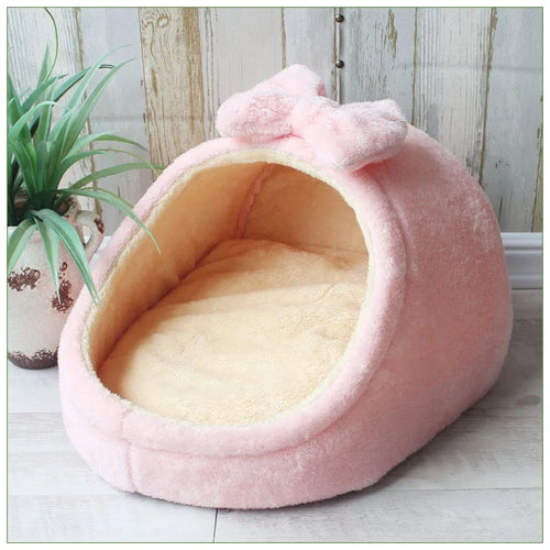 Soft cozy pet house bed for small dogs and cats, featuring a plush interior and a durable fabric exterior.