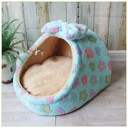 Soft cozy pet house bed for small dogs and cats, featuring a plush interior and durable fabric, ideal for comfortable sleeping.