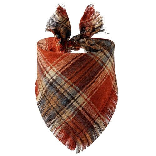 Plaid tassel dog bandana and triangular pet scarf for dogs and cats, stylish pet apparel with tassel accents.