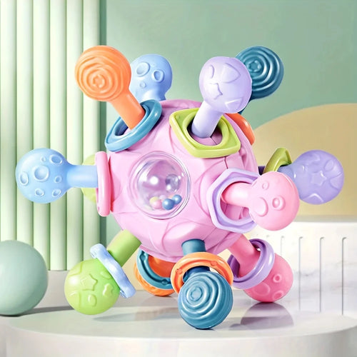 Pink soft rubber dog chew toy for teeth cleaning and grinding, designed for durable biting and playful chewing.