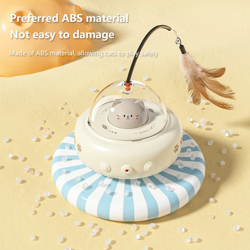 Pink UFO-shaped interactive cat teaser toy with bell and electric wand for engaging play and training with cats.