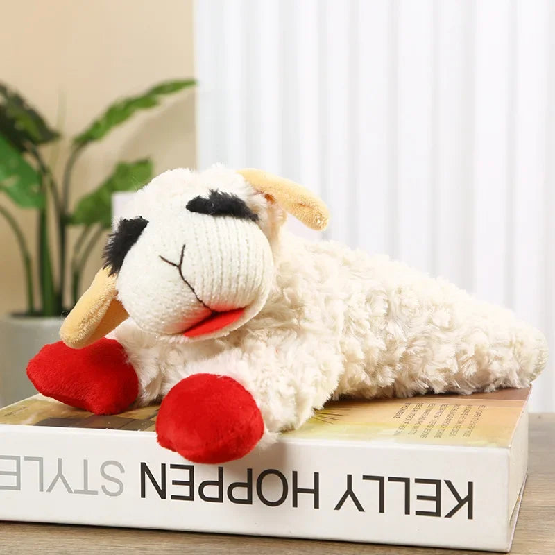 Soft plush dog toy featuring a squeaky lamb and lying sheep design, made of cuddly alpaca fabric for small to medium dogs.