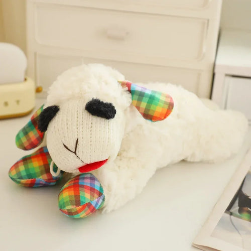 Soft plush dog toy featuring a squeaky lamb, lying sheep design, made of plush alpaca material for pets to chew and play.