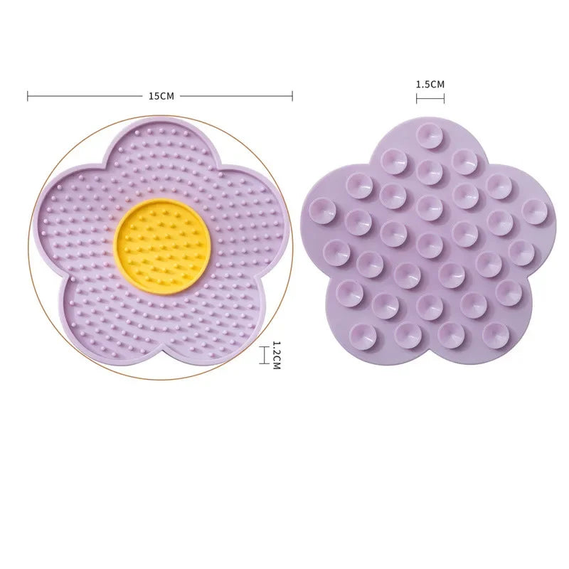 Red sunflower-shaped silicone pet licking pad for cats and dogs, designed as a slow feeder bowl for pet enrichment.