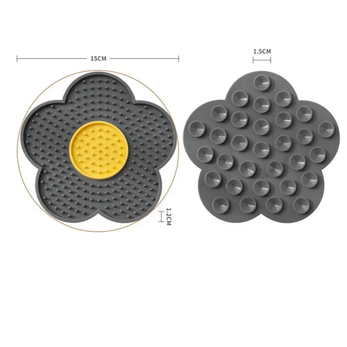 Red sunflower-shaped silicone pet licking pad for cats and dogs, designed as a slow feeder bowl for pet enrichment.