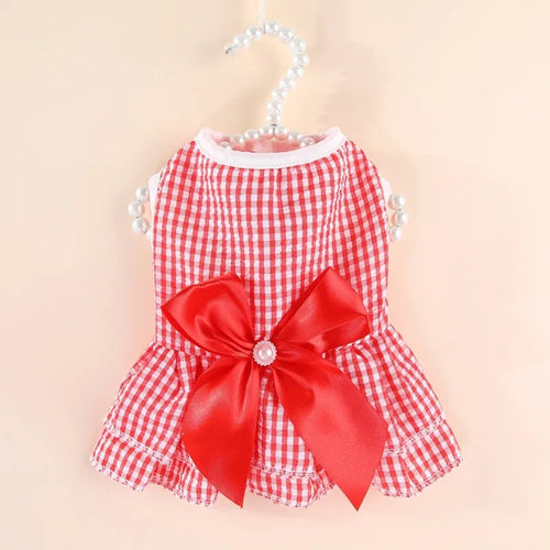 Pink floral summer pet dress for cats and puppies, striped plaid design, lightweight pet apparel suitable for warm weather.