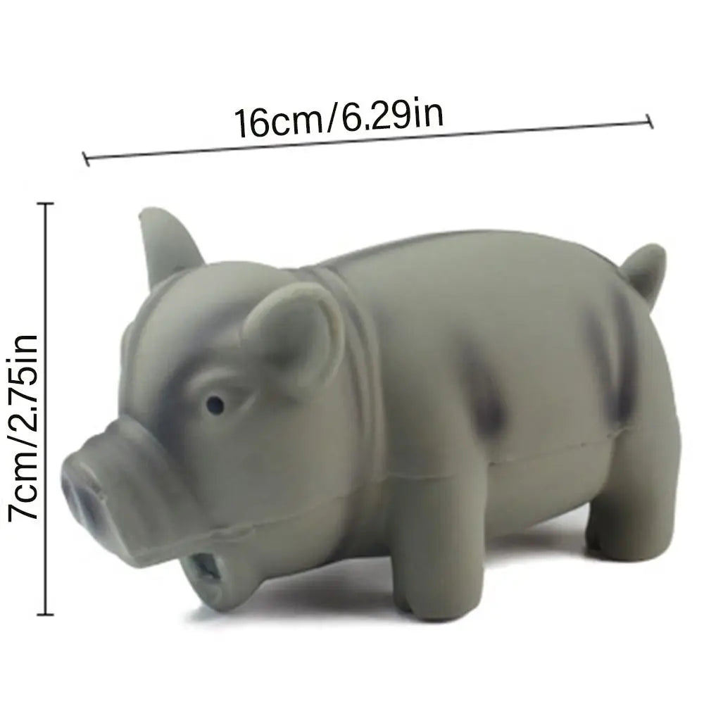 Yellow rubber pig dog toy with squeaking sound, made of latex, designed for chews and play for dogs.