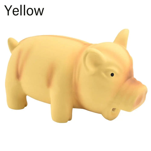 Yellow rubber pig dog toy with squeak and grunting sound, made from latex, designed for pets to chew and play.