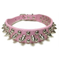 Pink adjustable leather dog collar with punk style, featuring a sturdy strap and metal buckle for pets.