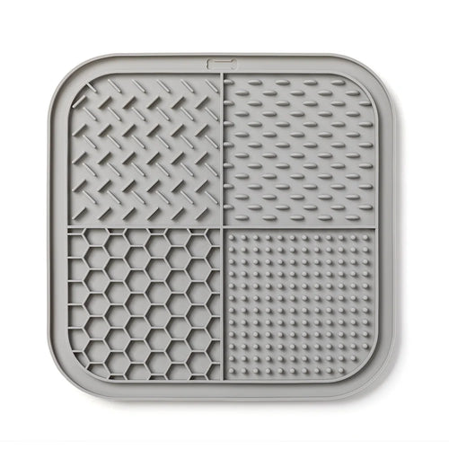 Lake blue silicone pet lick mat for dogs and cats, 20cm slow food plate with suction cups for mess-free feeding.