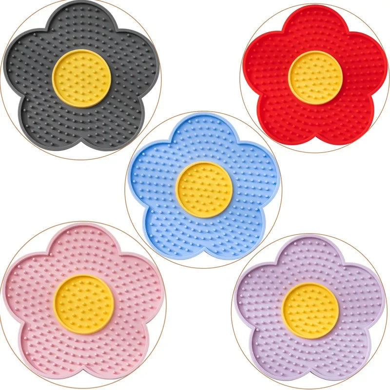 Blue silicone pet licking mat for dogs and cats, sunflower shape slow feeder bowl designed to entertain and soothe pets.